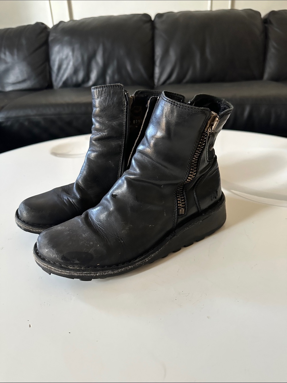 Fly London Black Leather Zip Booties